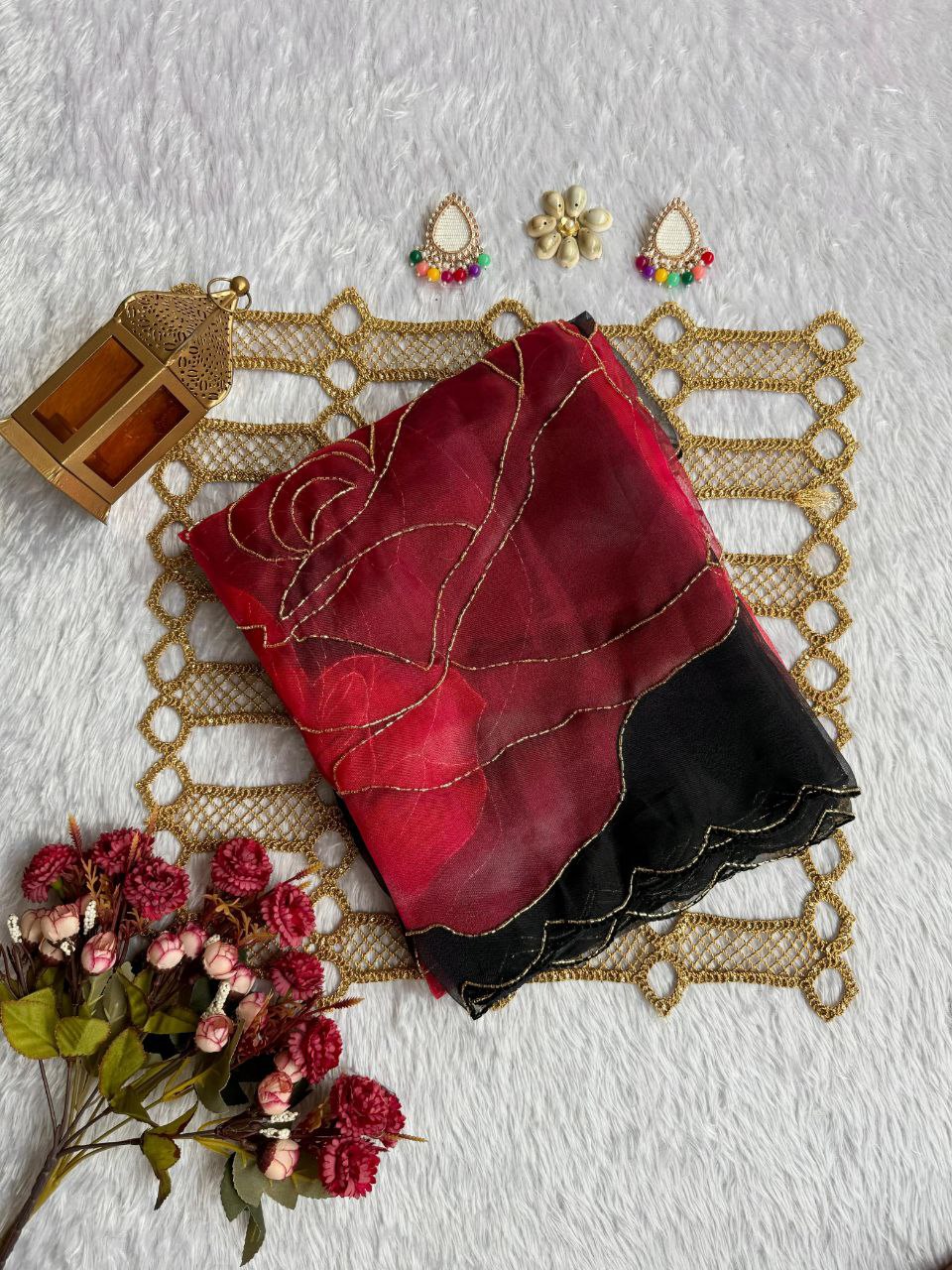 Black saree with red floral print