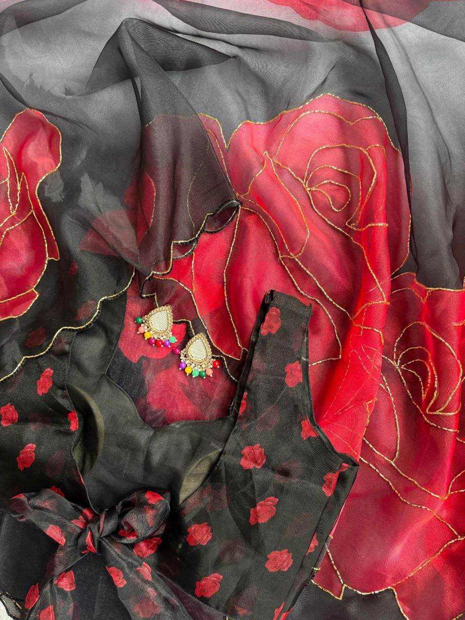 Black saree with red floral print